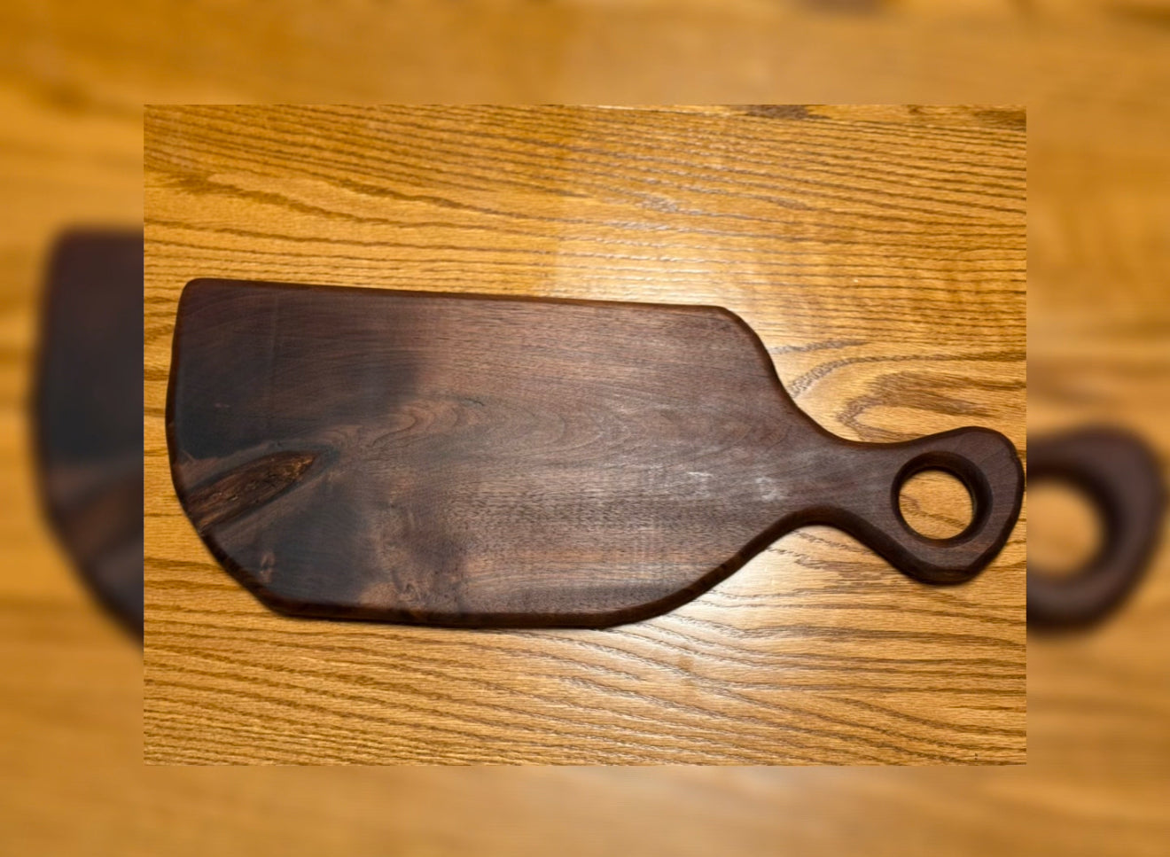 Walnut cutting board with handle